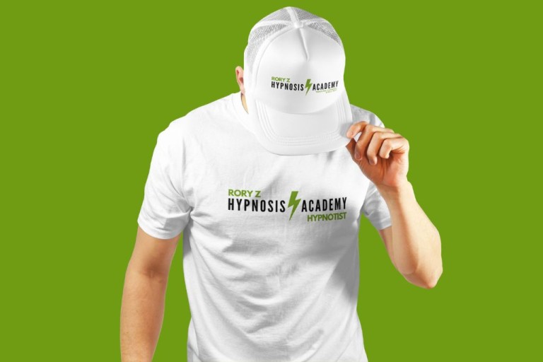 Man wearing a Rory Z Hypnosis Academy t-shirt and cap
